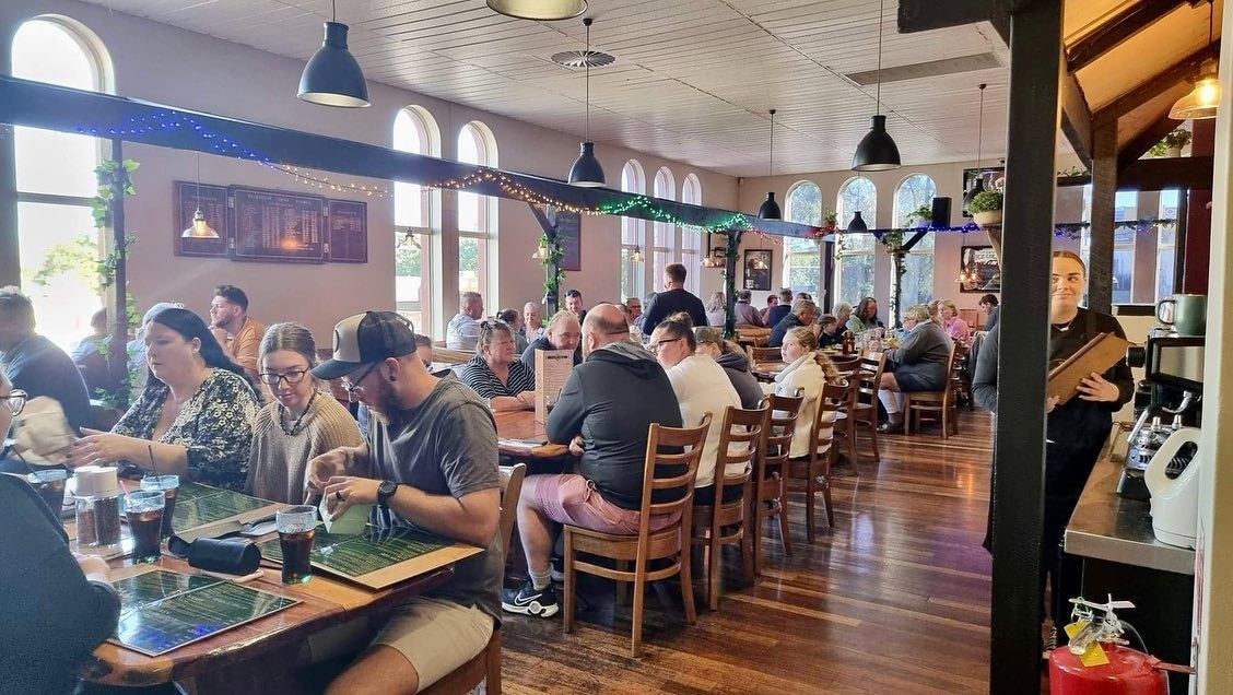 A Large Group of People Are Sitting at Tables in a Restaurant — The Shire Bar & Grill In Dubbo, NSW