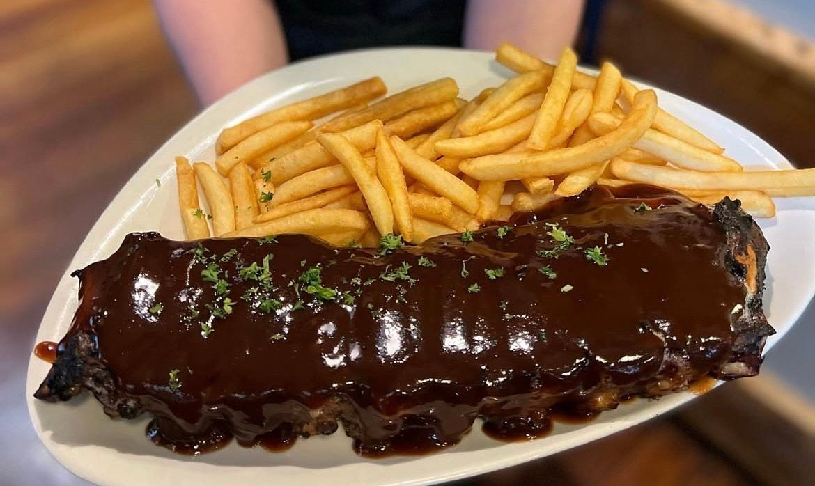 Full rack of BBQ ribs with golden fries. — The Shire Bar & Grill In Dubbo, NSW