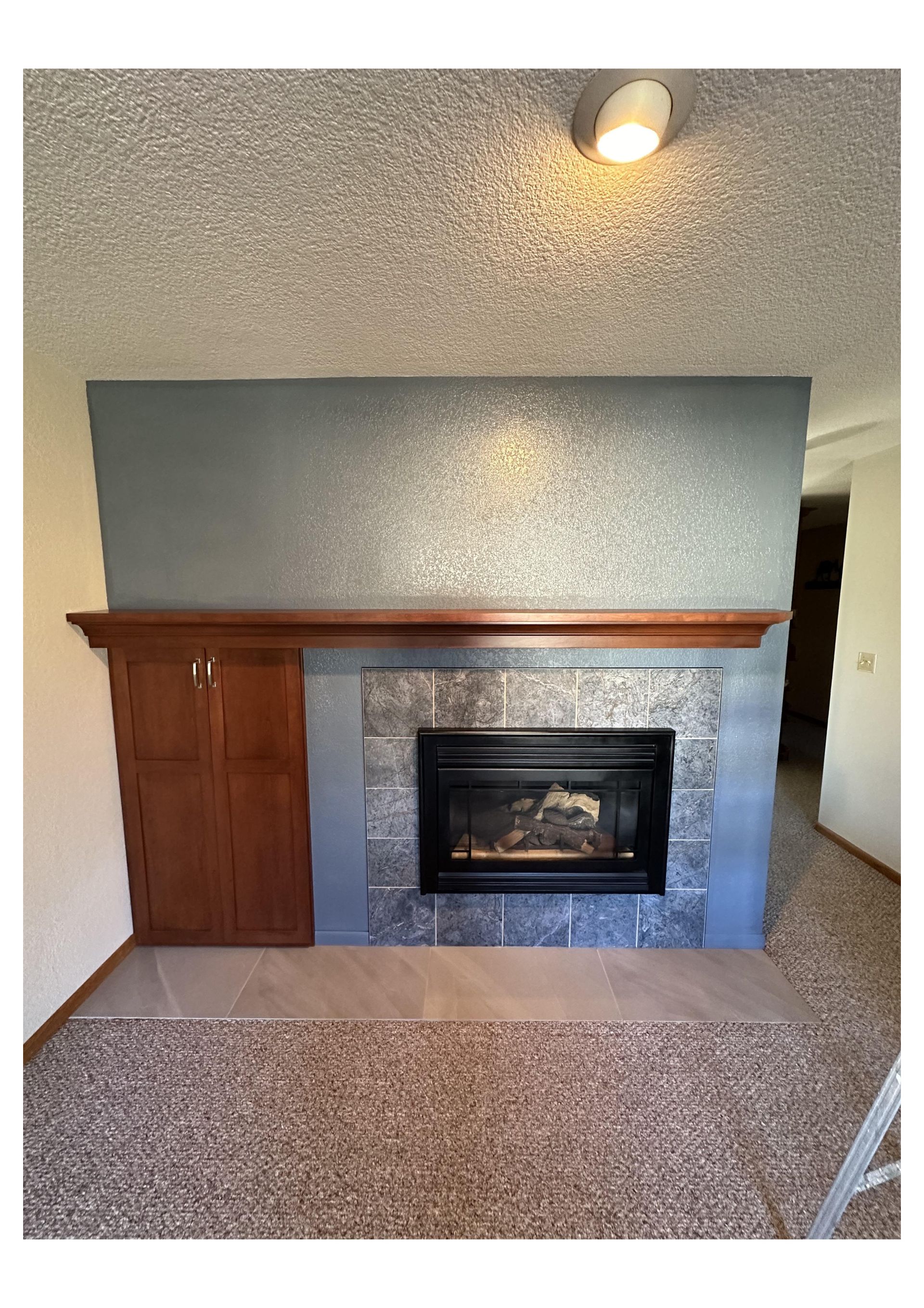 The back of a house with a deck and stairs.