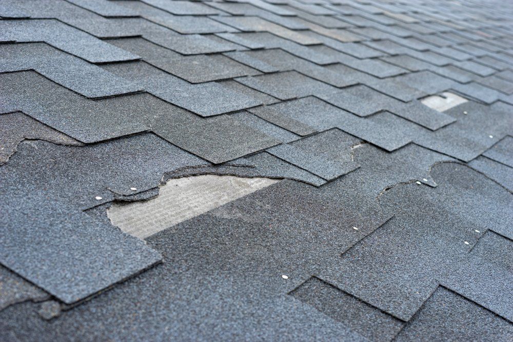 A close up of a roof with a hole in it.