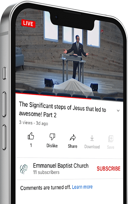 Smartphone displaying a live stream of a preacher at Emmanuel Baptist Church.