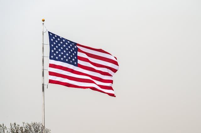 A waving American flag creates a patriotic tribute for cremation services Westminster, MD