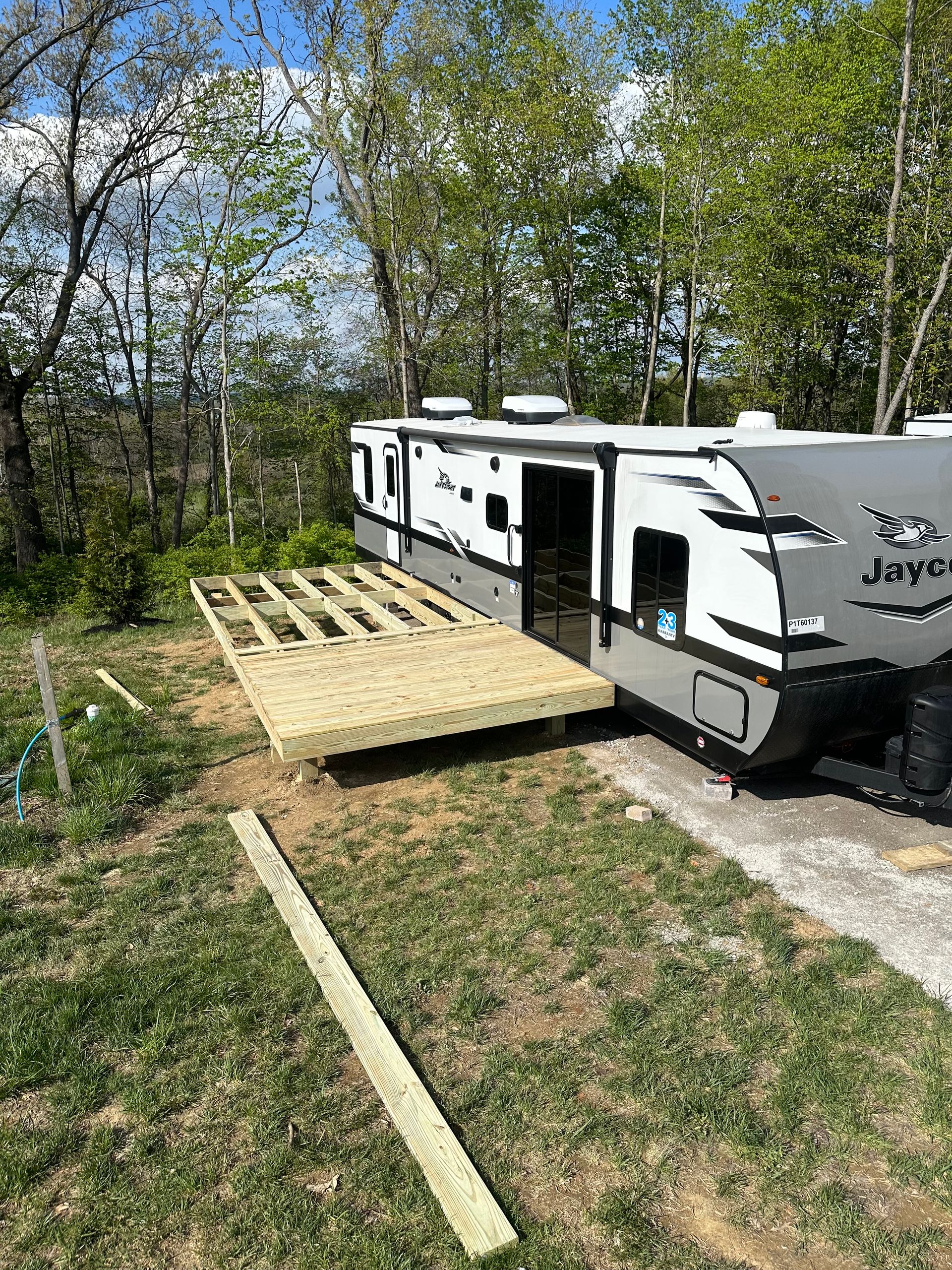Pressure Treated deck attached to RV at Camp Cedar