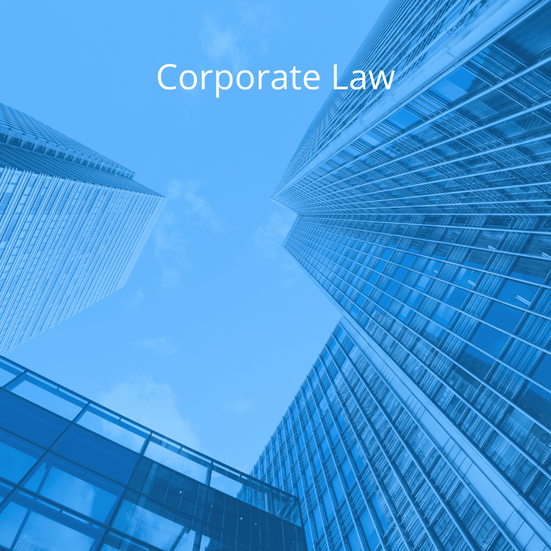 Looking up at skyscrapers with the words corporate law on the bottom