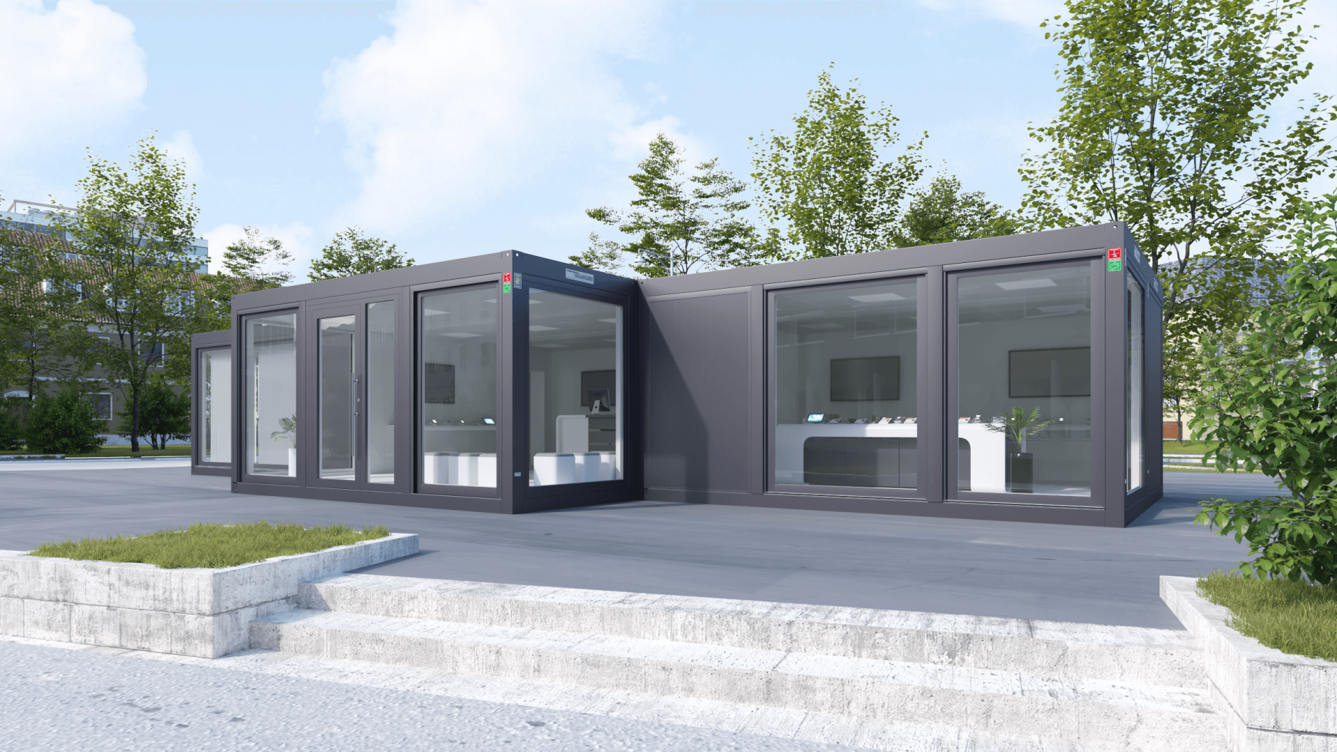 Een groot gebouw met veel ramen staat op een parkeerplaats.