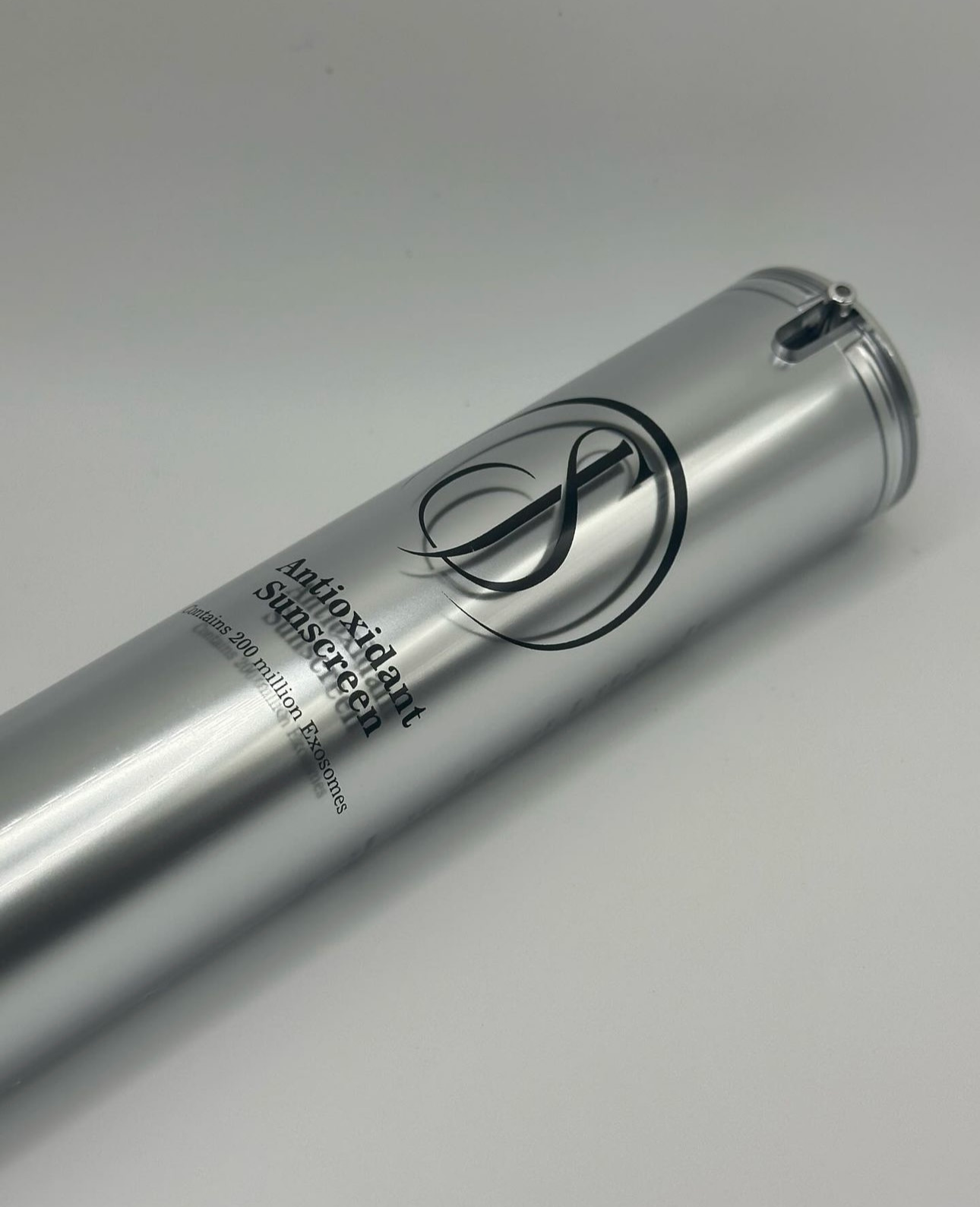 Silver skincare bottle with 