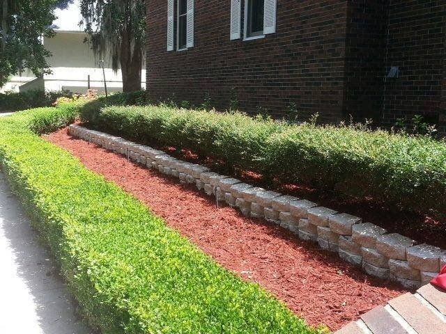 Flower Bed Margin — Beautiful Design of Grasses with Mulch in Center in Brunswick, GA