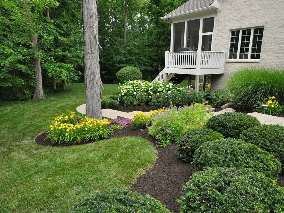 Flower Bed Brink  — Green Grasses with Beautiful Design in Brunswick, GA