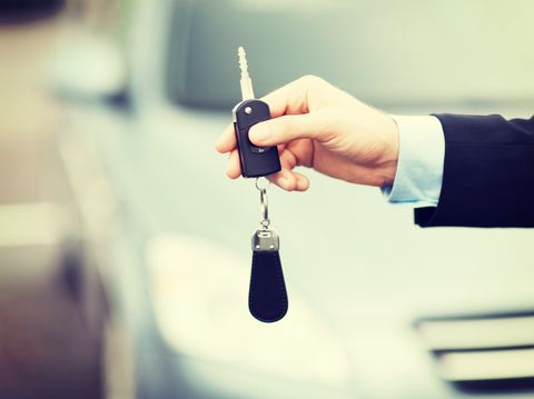 Car Dealership handing over keys to new Car Loans Adelaide customer