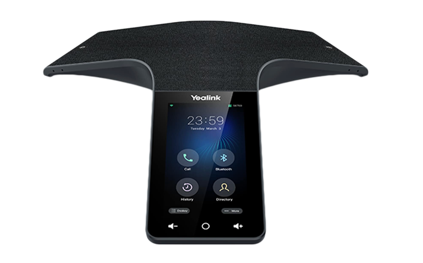 A phone is sitting on top of a table with a speaker attached to it.