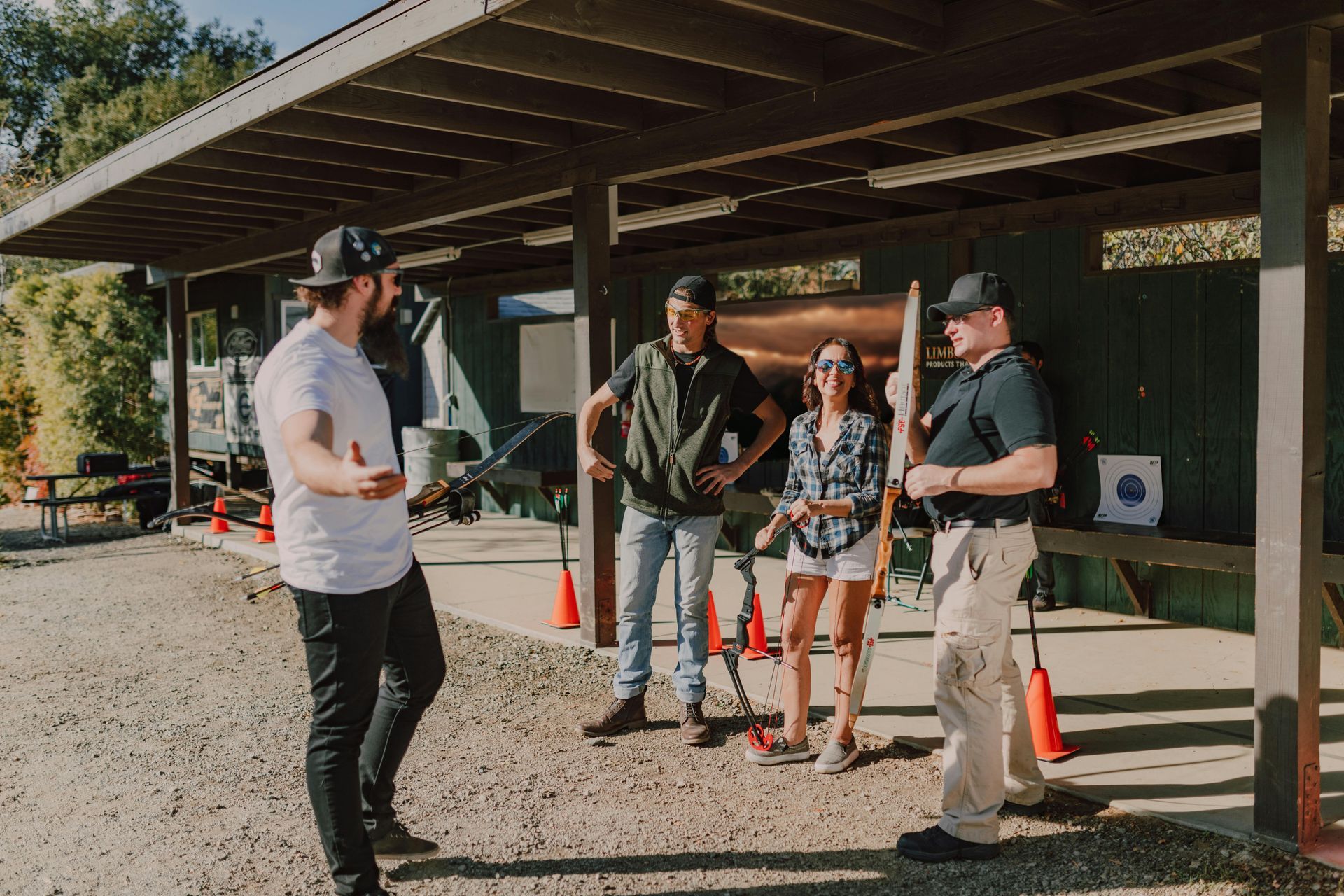 four people in front of a business