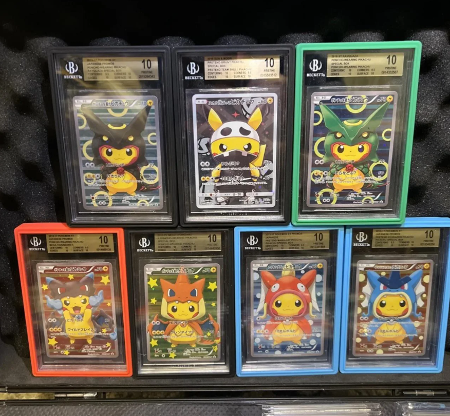 Seven graded Pikachu Pokémon cards in colorful cases, arranged in a display.