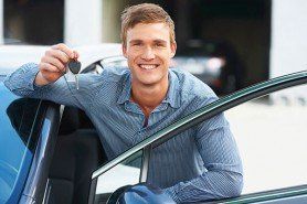 Happy Guy with a Car — Insurance Services in Palm City, FL