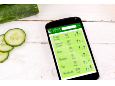 A cell phone with a calorie calculator on the screen