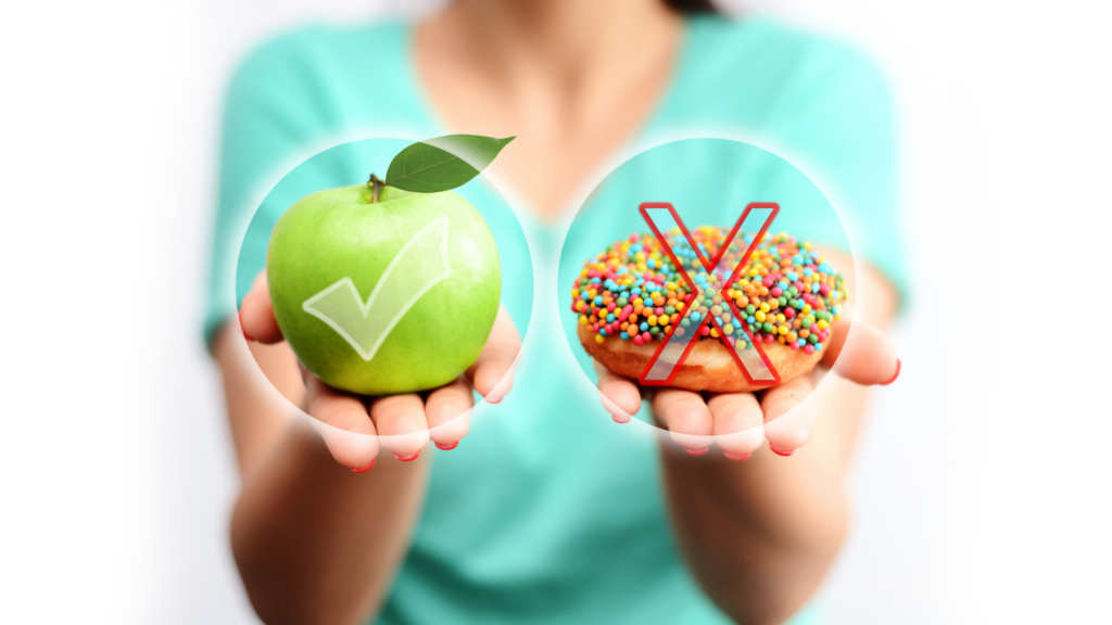 A woman is holding an apple and a donut in her hands.