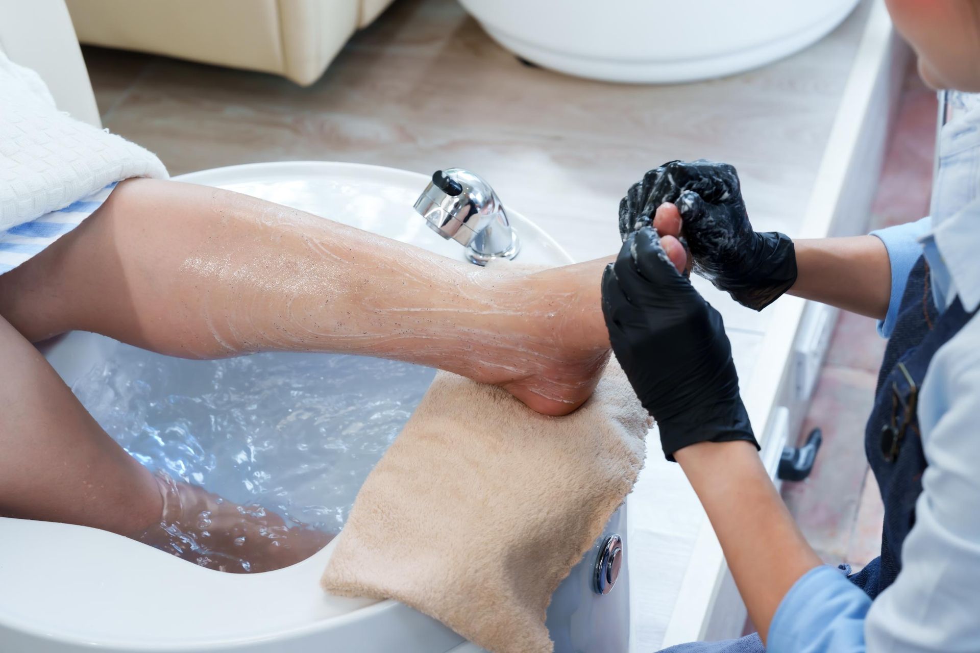 Person getting a pedicure. 