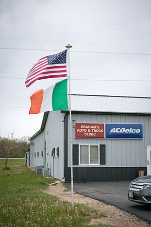 Flags outside the shop | Grahams Auto & Truck Clinic