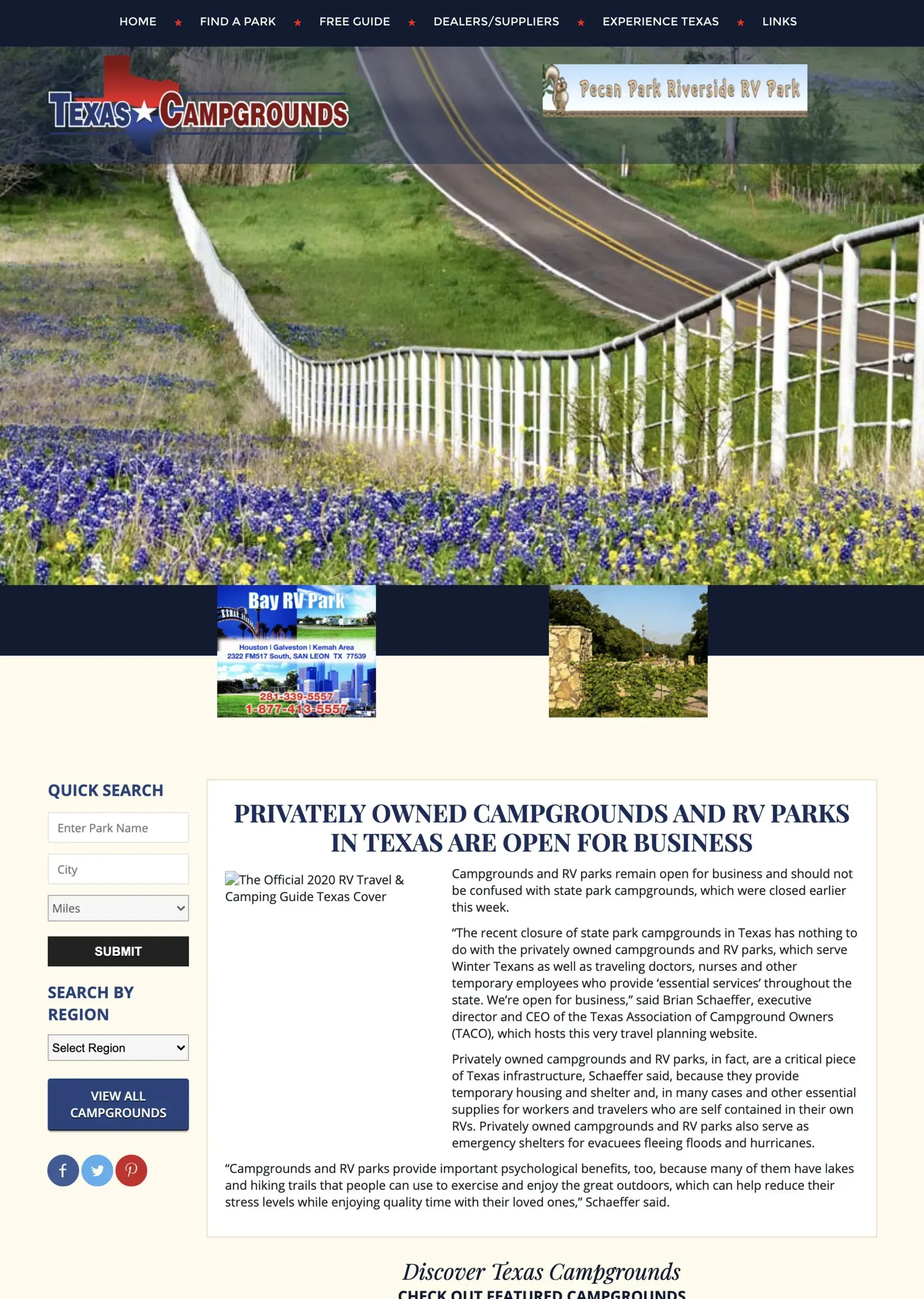 A website with a picture of a fence and a road on it.