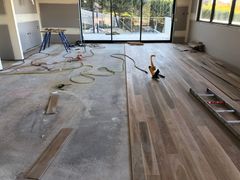 floor installation with hammer