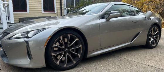 Lexus LC 500 grand tourer with smooth gloss, clean lines, and detailed wheels.