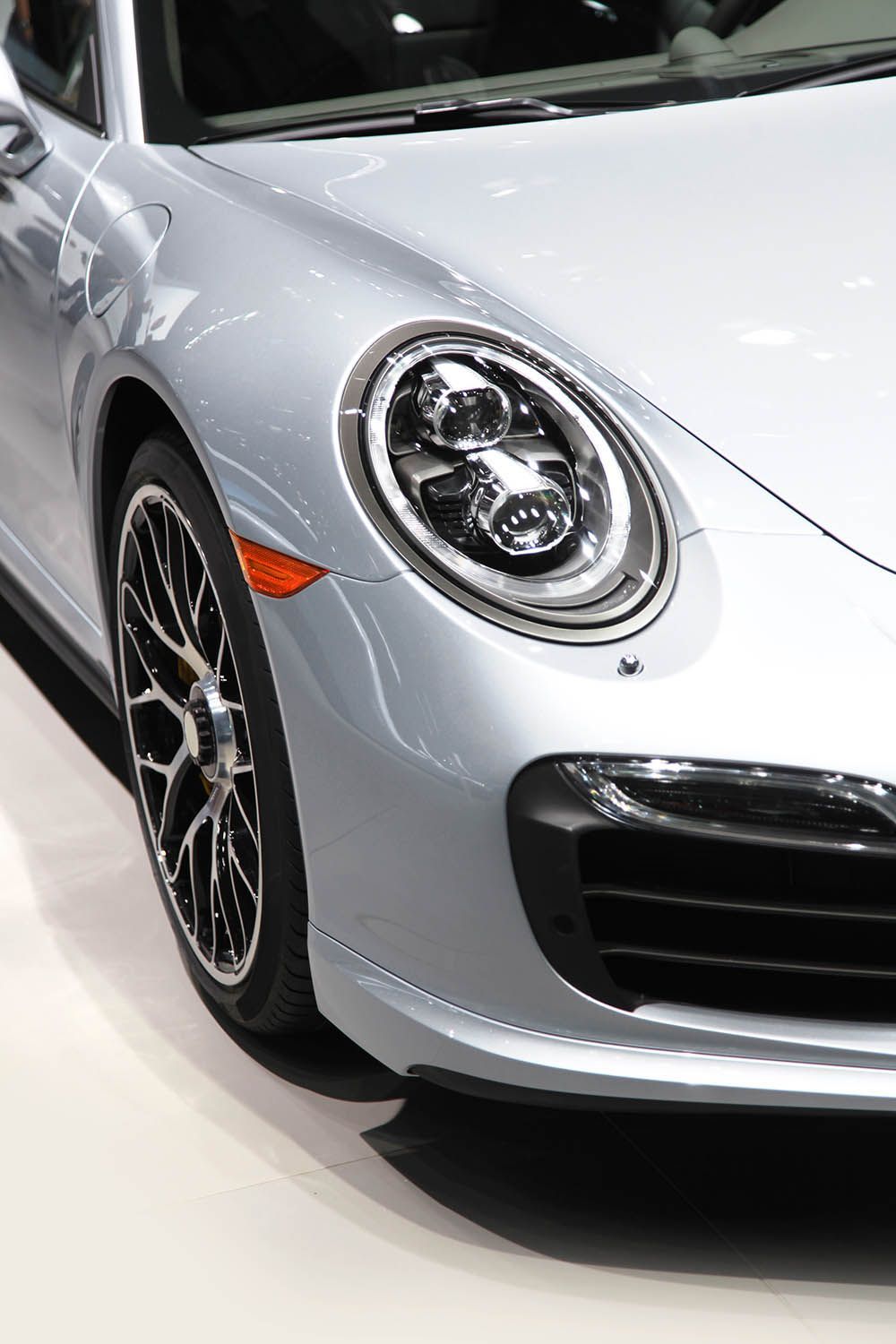 closeup of front of exotic white car