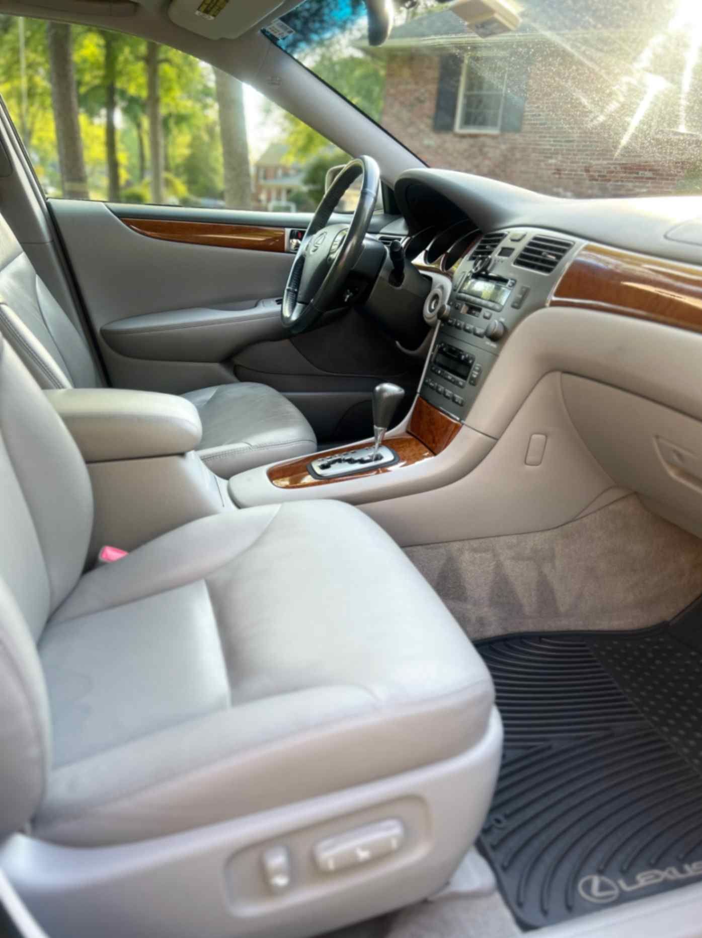 BMW 2 Series coupe with crisp reflections, clean wheels, and a glossy finish after a meticulous wash.