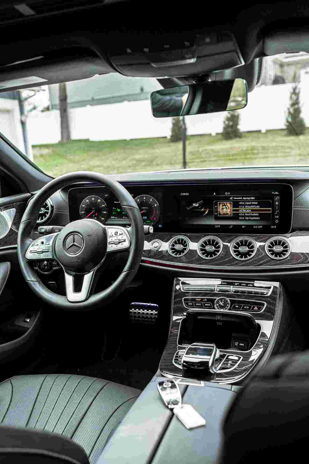 Close-up of luxury car dashboard highlighting clean interior finish.