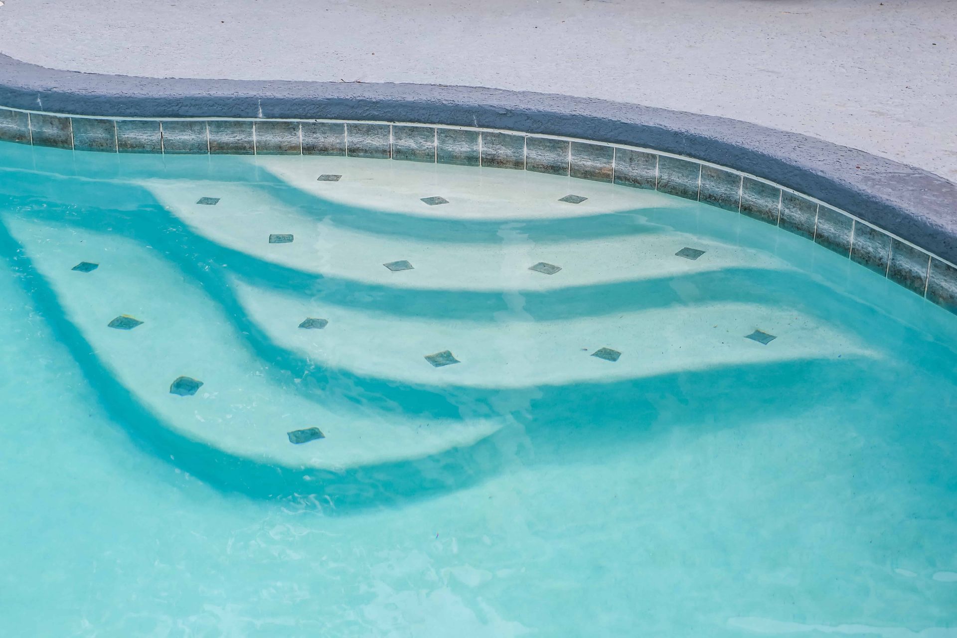 A swimming pool steps under water