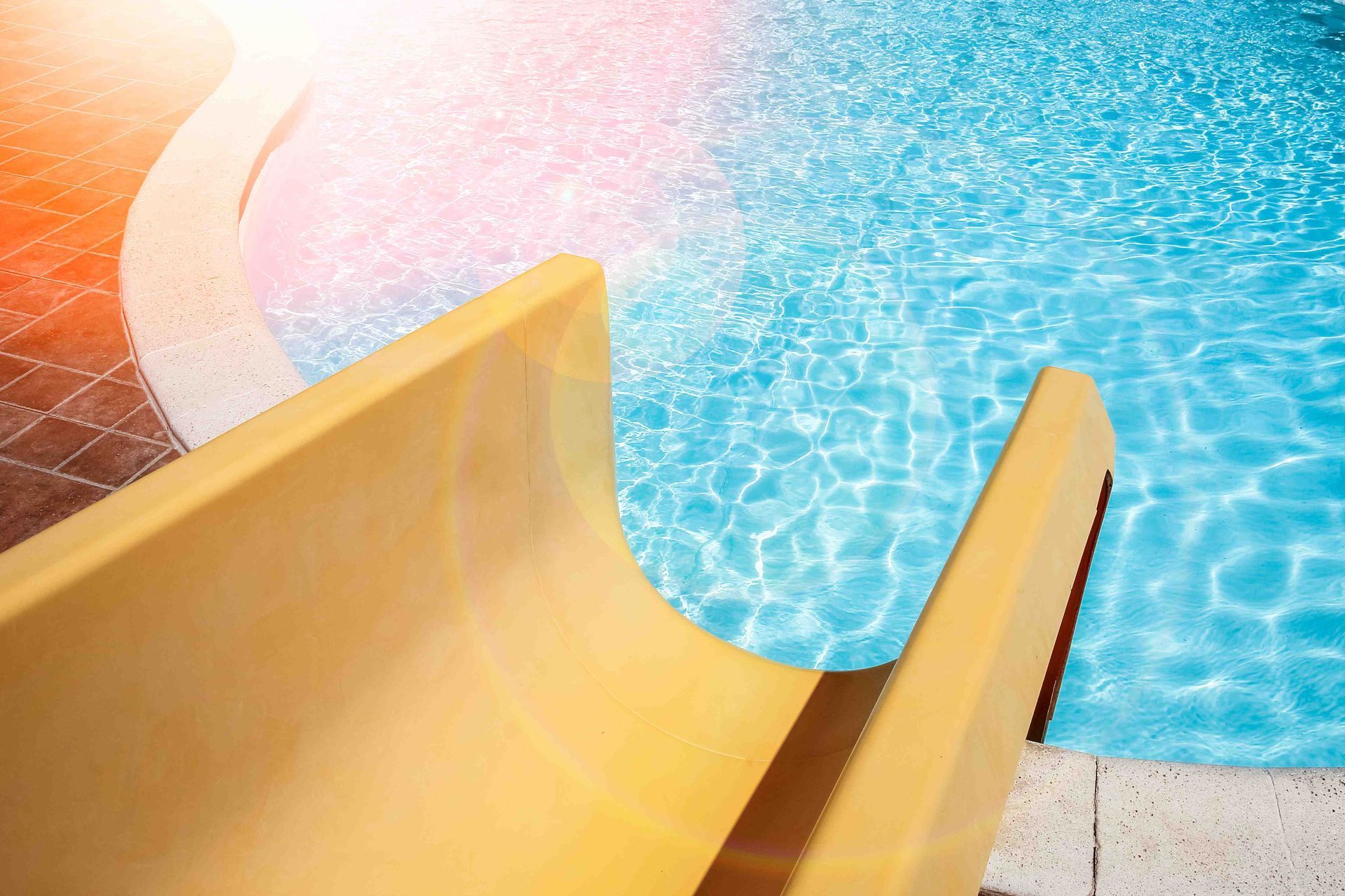 A pool slide at a home pool