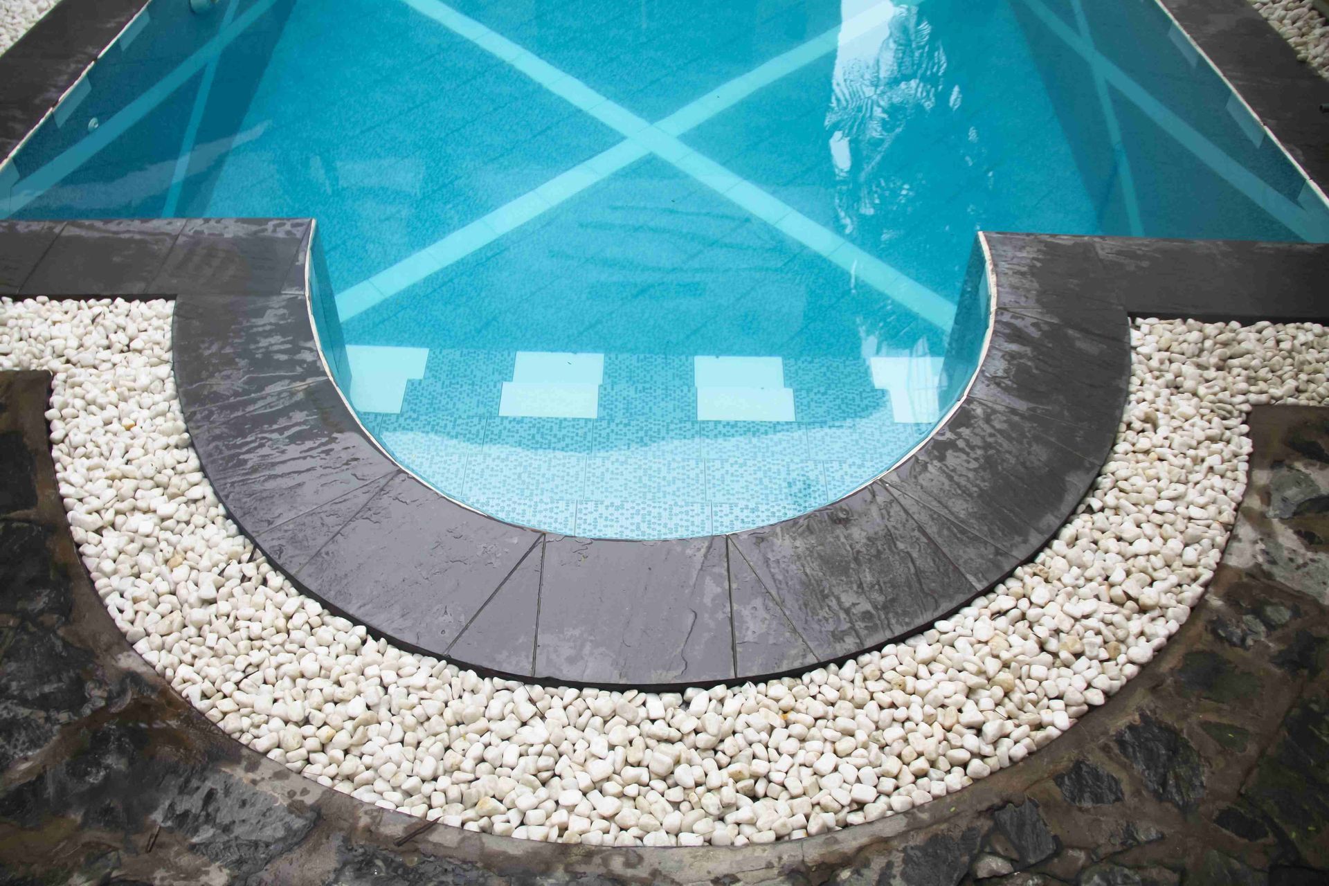 A concrete pool with cool desgin