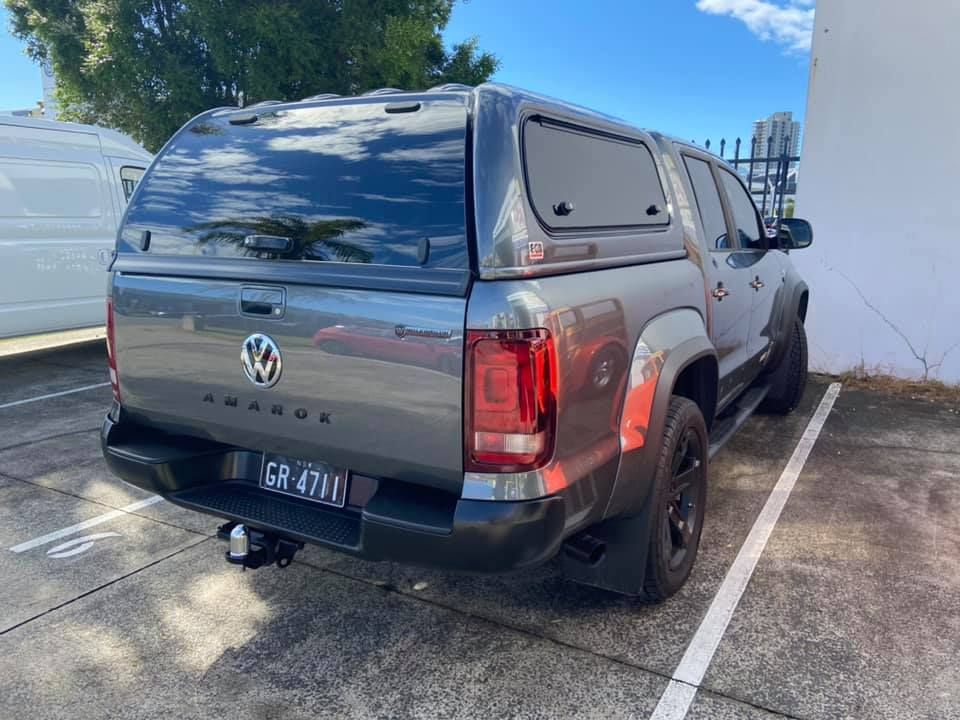 A Volkswagen Amarok with A Canopy Is Parked in A Parking Lot — Motor Accessories Direct In Tweed Heads South, NSW