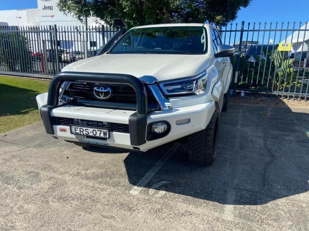 White Toyota Pickup Truck With a Black Bull Bar — Motor Accessories Direct In Robina, QLD