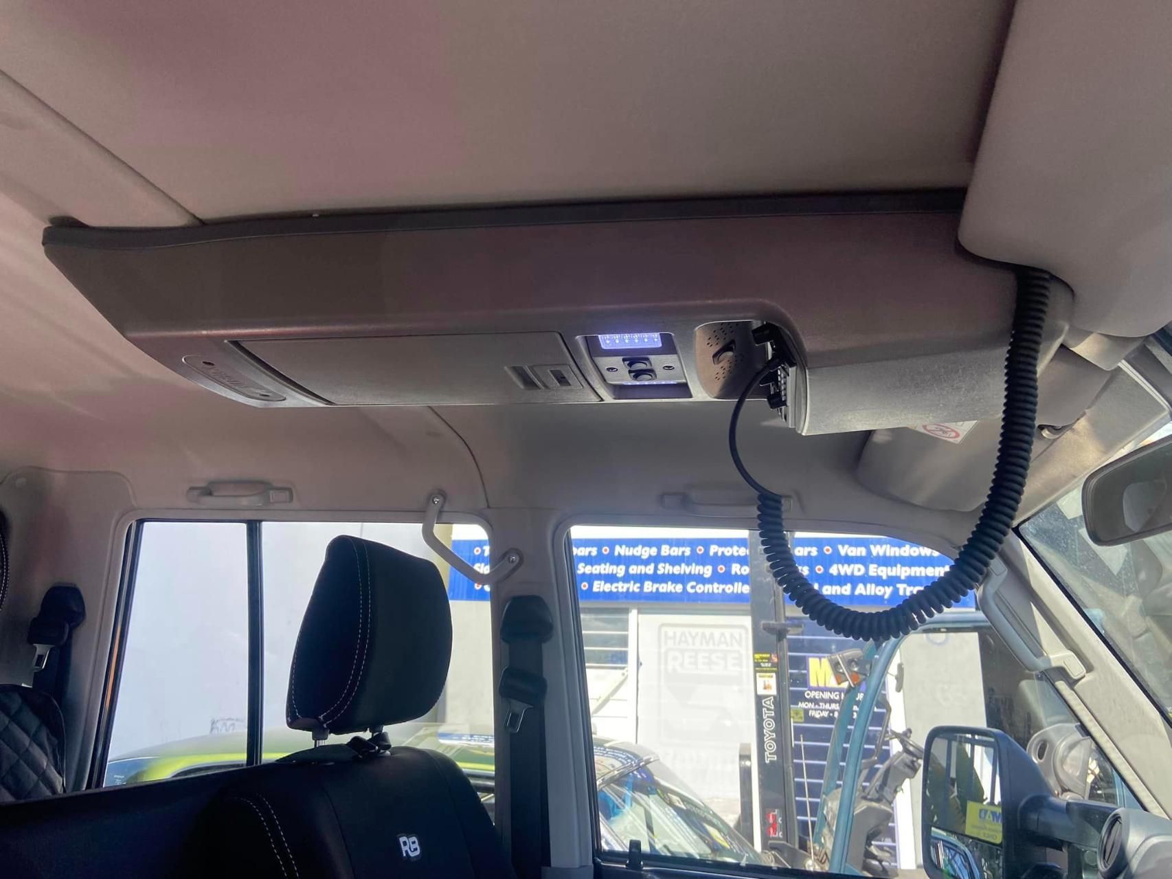 Interior of a Car: a Console Above the Driver, Displaying a Radio — Motor Accessories Direct In Southport, QLD