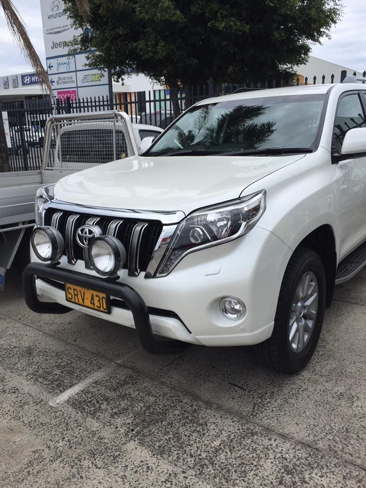 White Toyota Land Cruiser Prado With Spotlights — Motor Accessories Direct In Southport, QLD