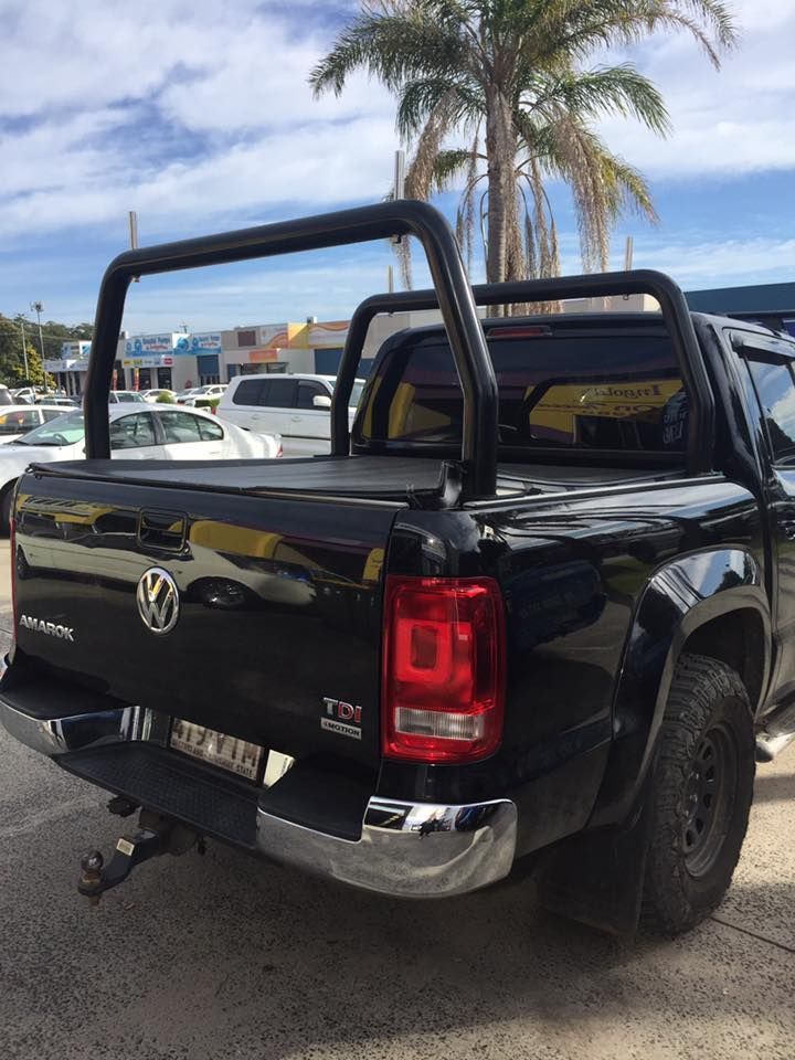 Black Volkswagen Amarok Pickup Truck With Roll Bar — Motor Accessories Direct In Byron Bay, QLD