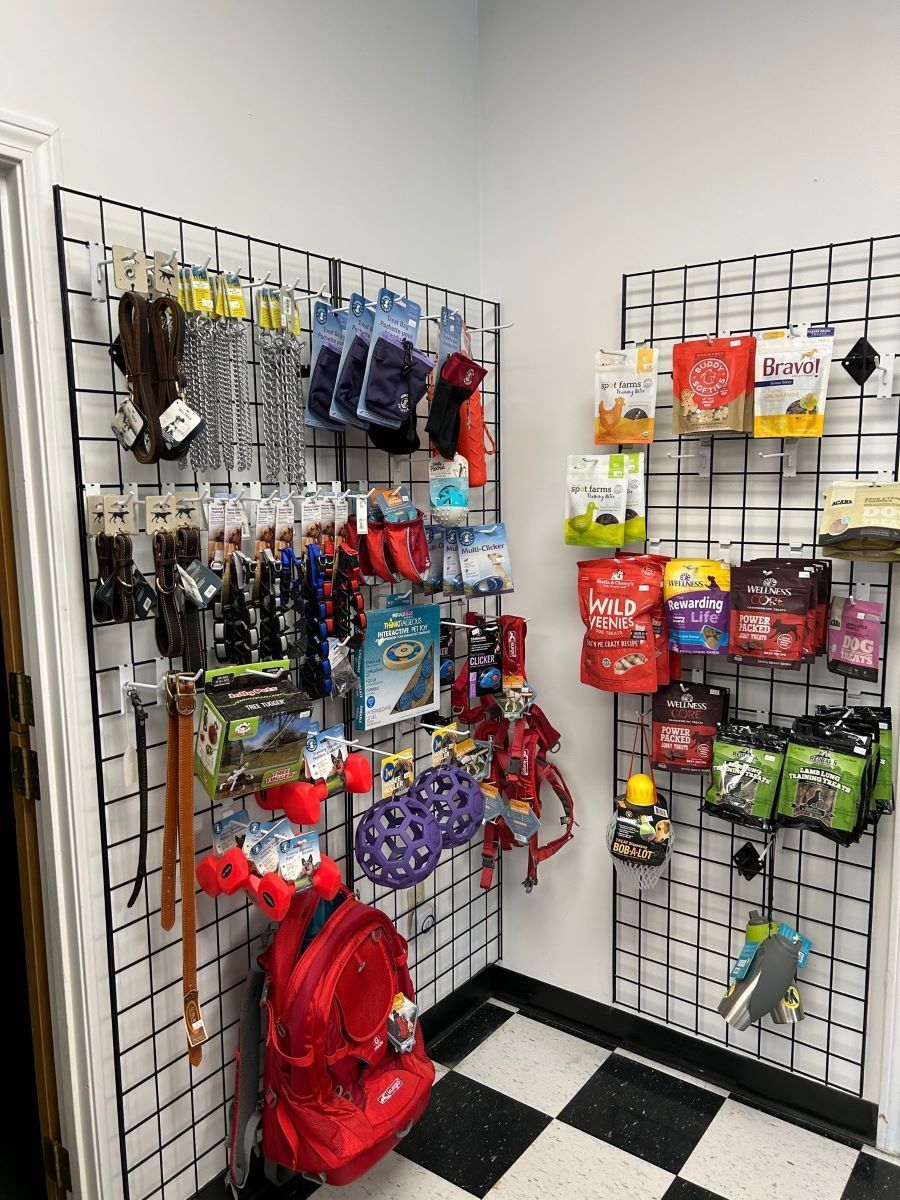 A room filled with lots of dog supplies and toys.