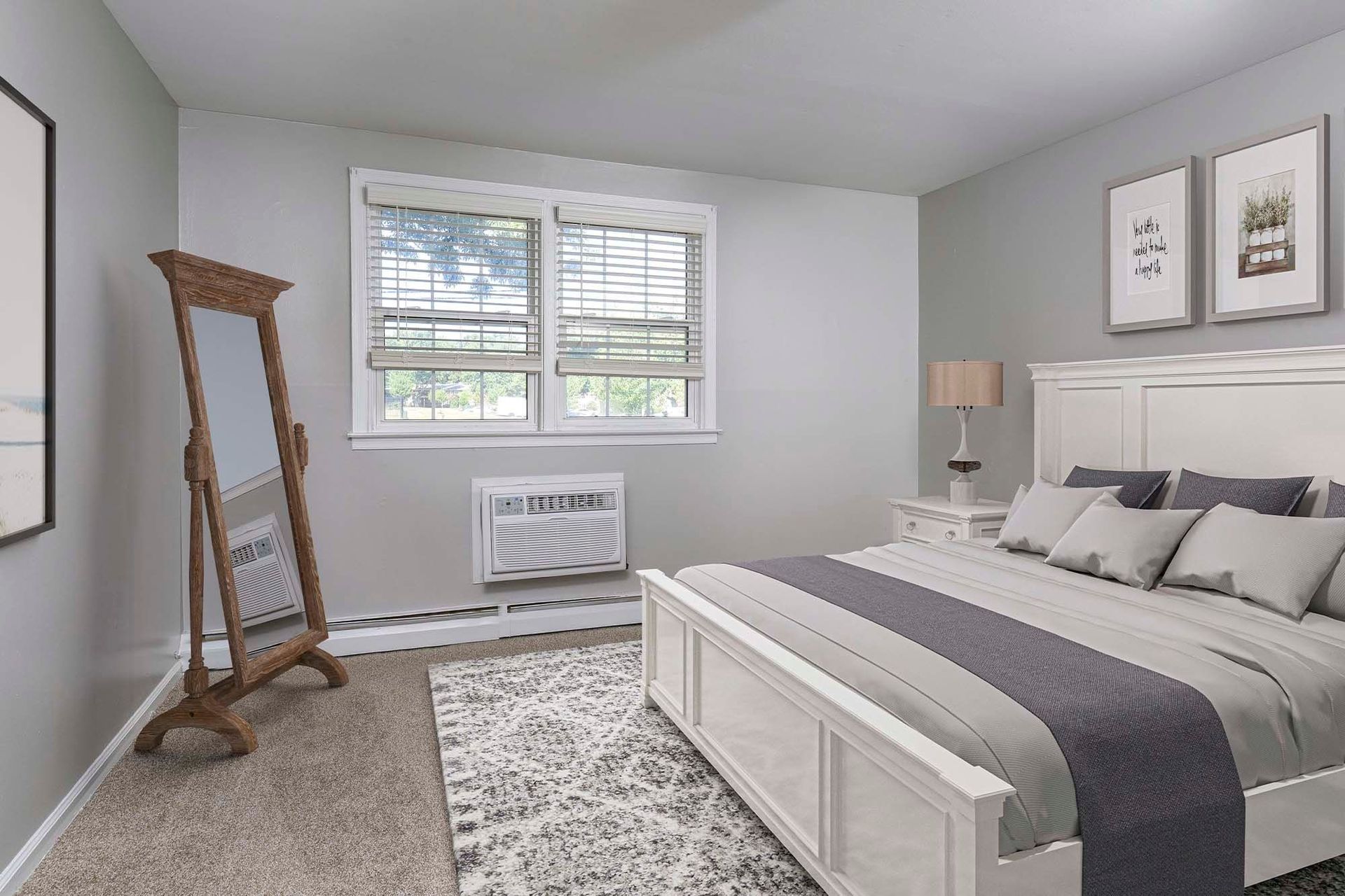 Bedroom with a white paneled bed, gray walls, blinds, carpet, and a window air conditioner.