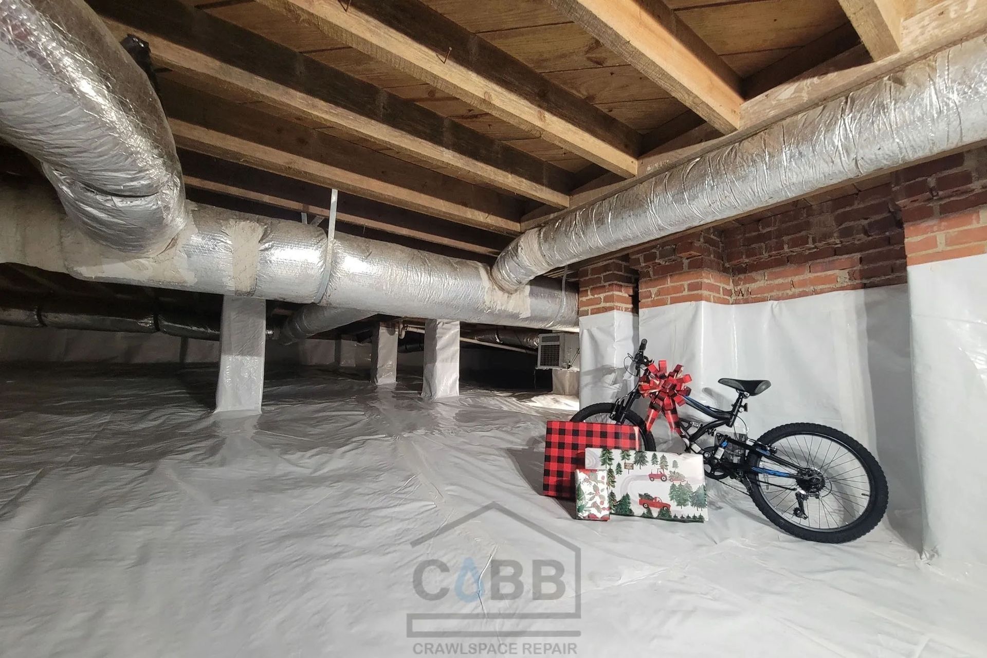 Bike and Gifts in Crawlspace — Anderson, SC — Cobb Crawlspace Repair LLC