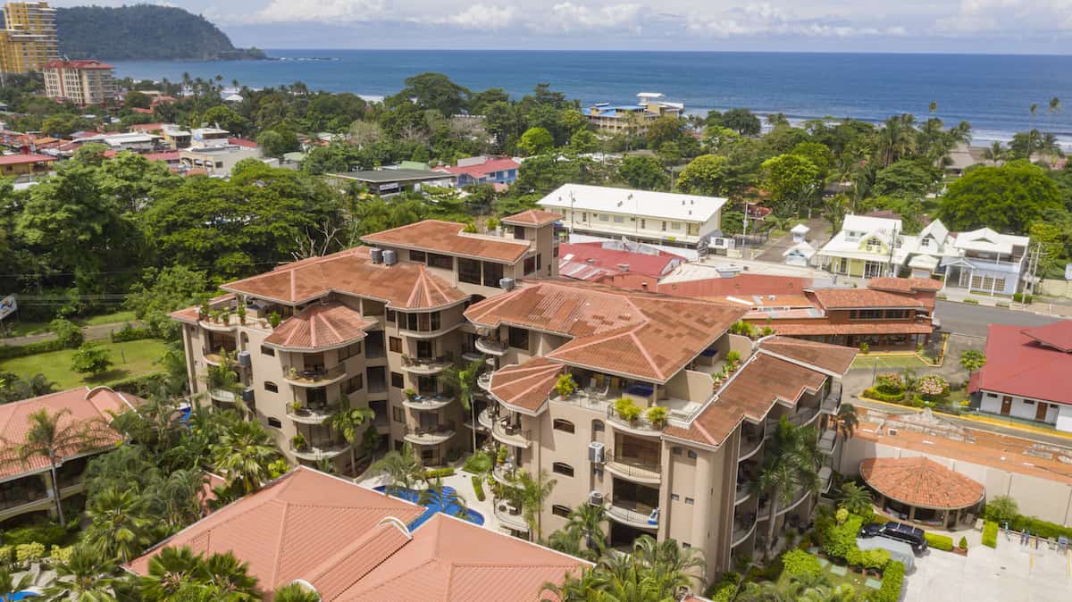 An aerial view of a city with a lot of buildings and trees.