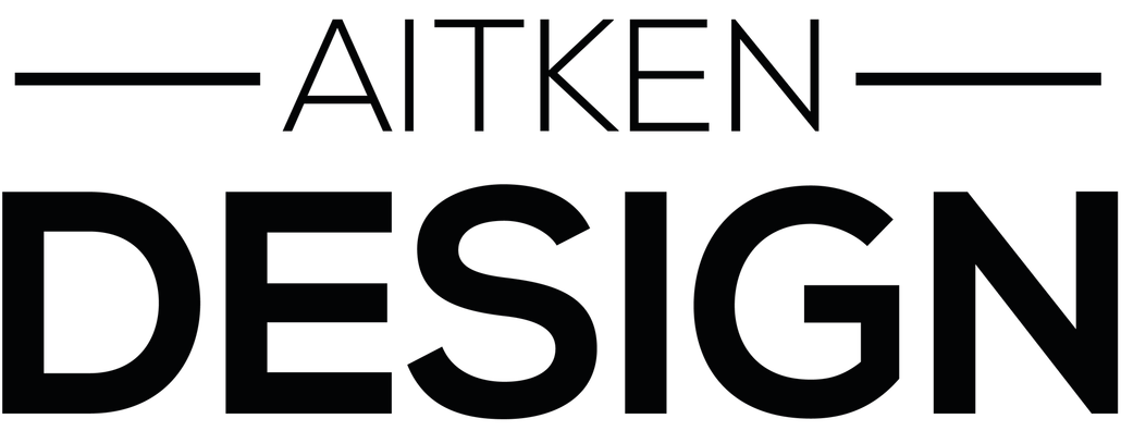 A black and white logo for aitken design on a white background.