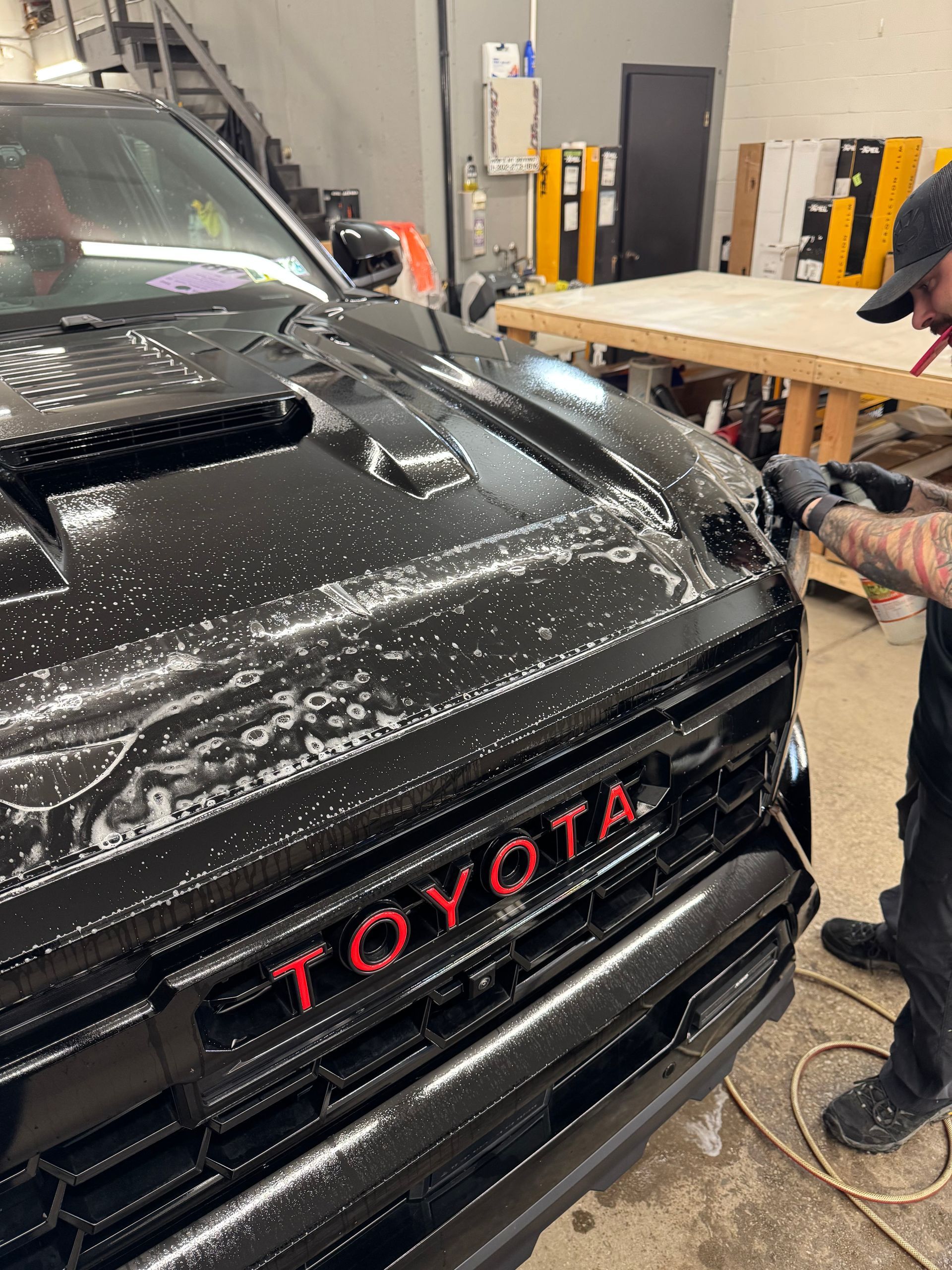 Black Toyota truck with red 