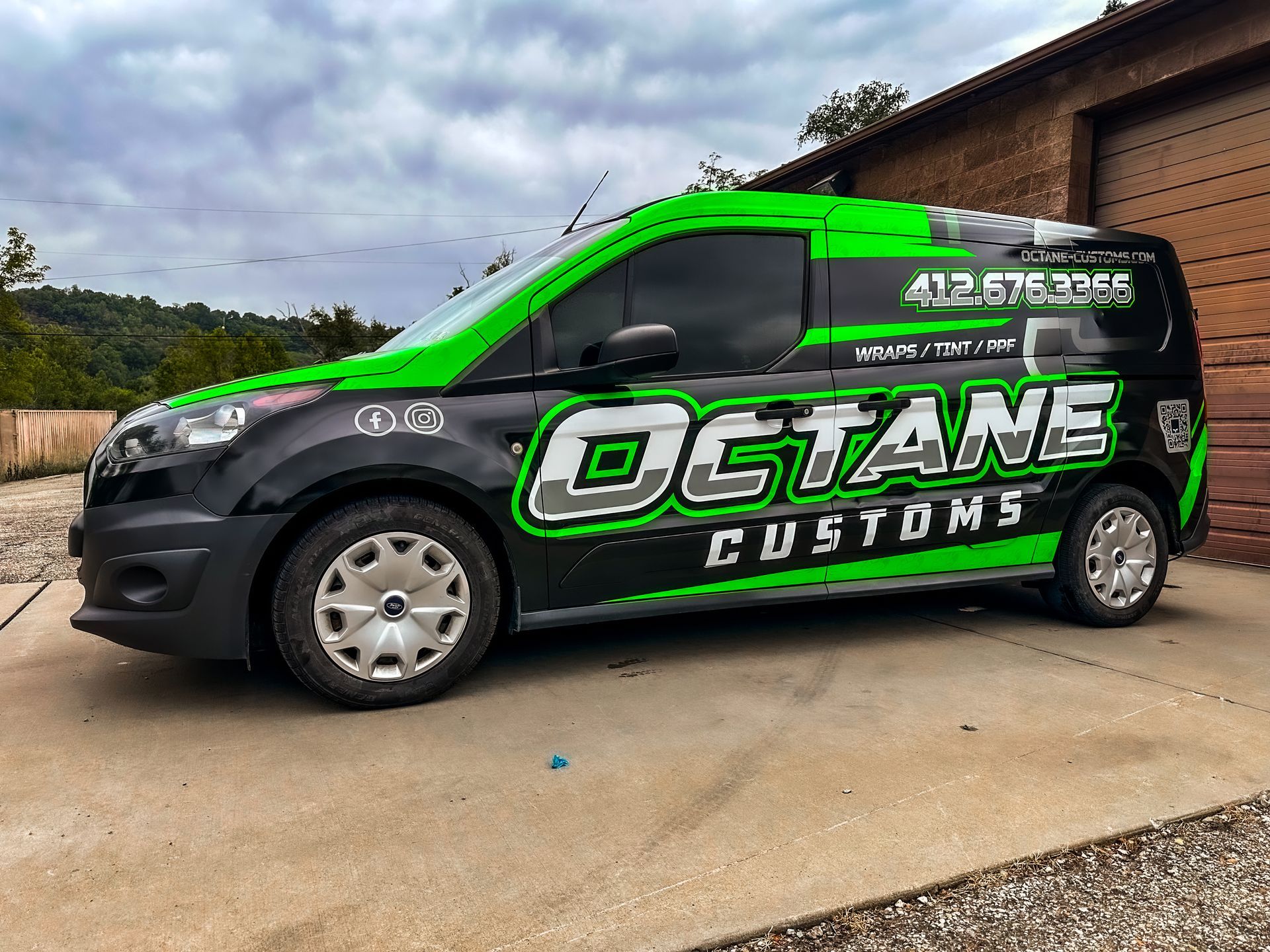 Black and green custom van with