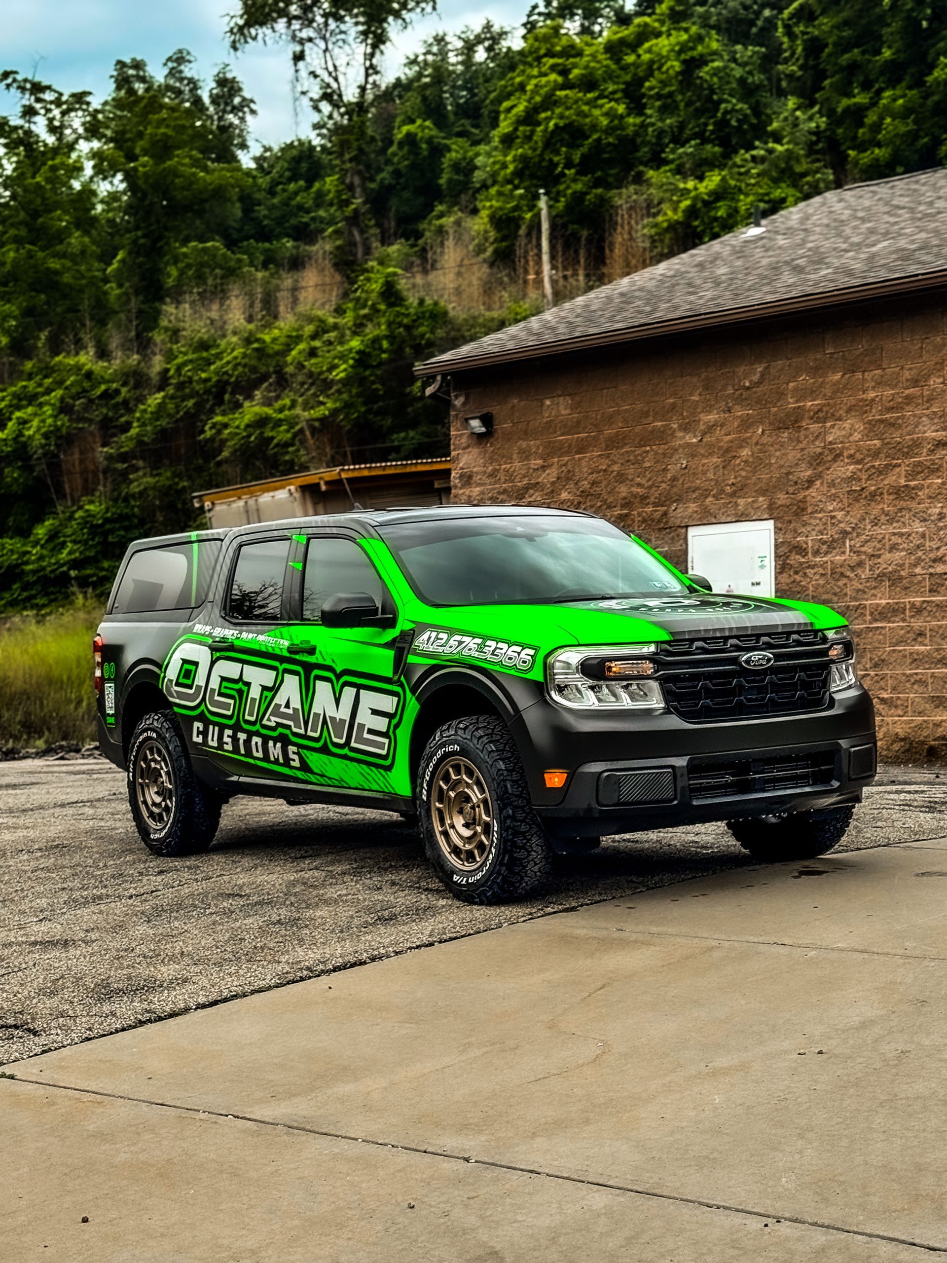 Green and black customized Ford truck with 