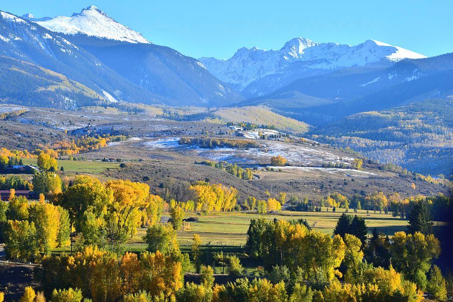 a landscape with mountains and trees