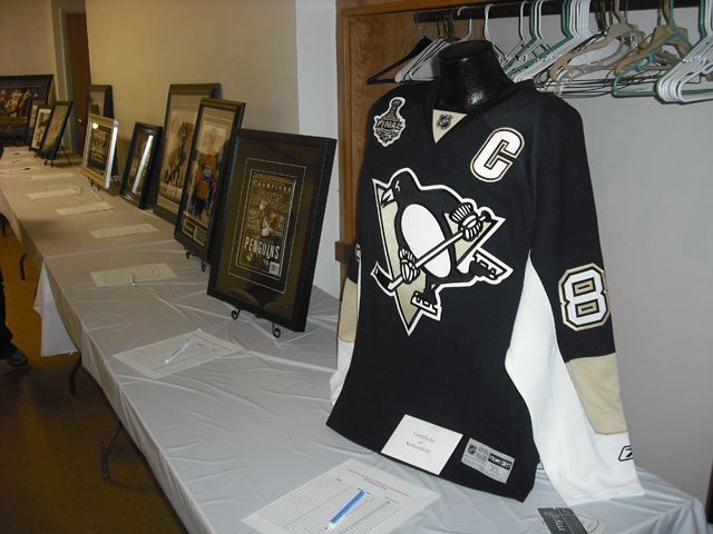 A hockey jersey with the number 8 on it