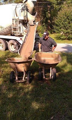 Man Getting Concrete Cement — Hampton Roads, VA — Tidewater Tank
