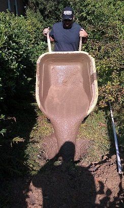 Man Holding Single Wheel Trolley — Hampton Roads, VA — Tidewater Tank