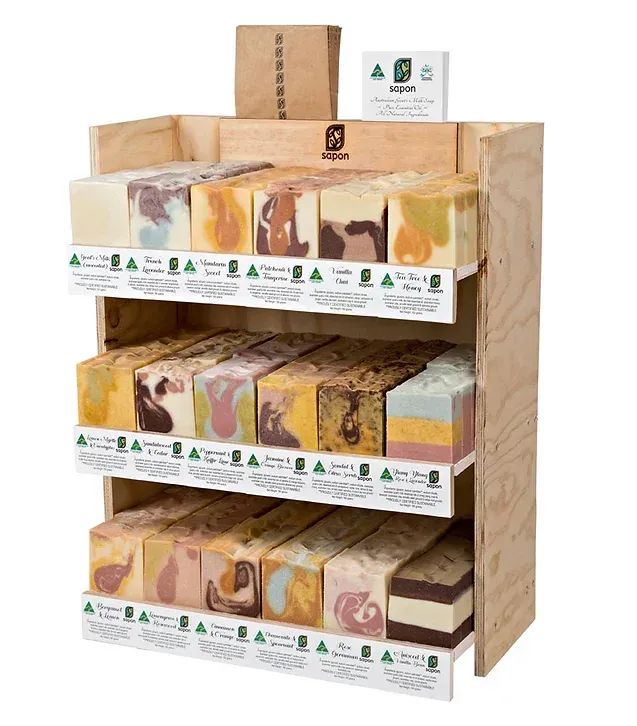 Wooden Retail Display Filled With Colorful Handmade Soap Bars, Arranged On Shelves With Product Labels — Atherton Health Food Centre in Atherton, QLD