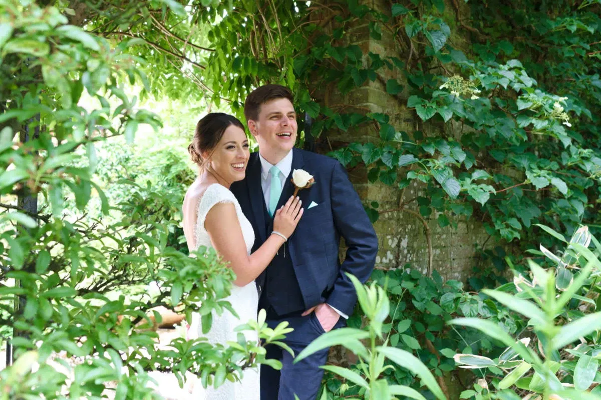 Bride and groom photographed at their Hampshire wedding