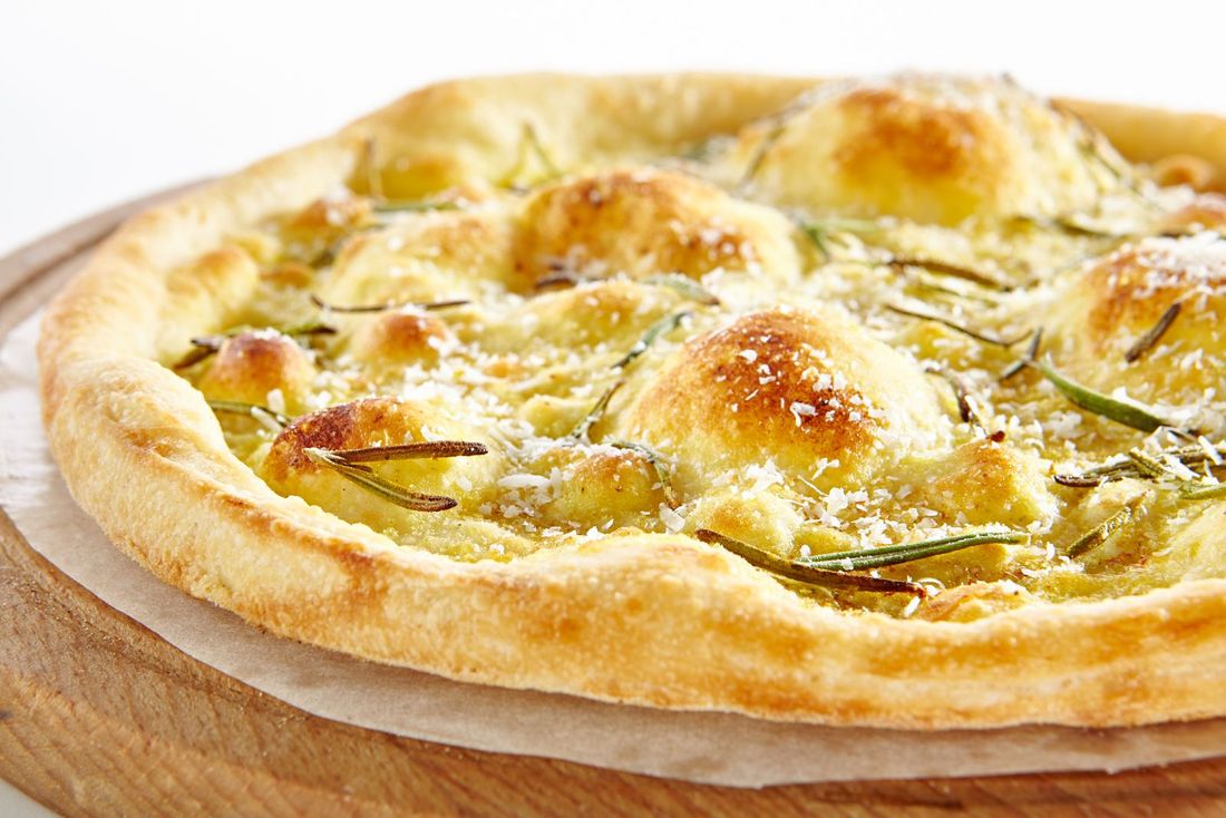 pizza with cheese and rosemary